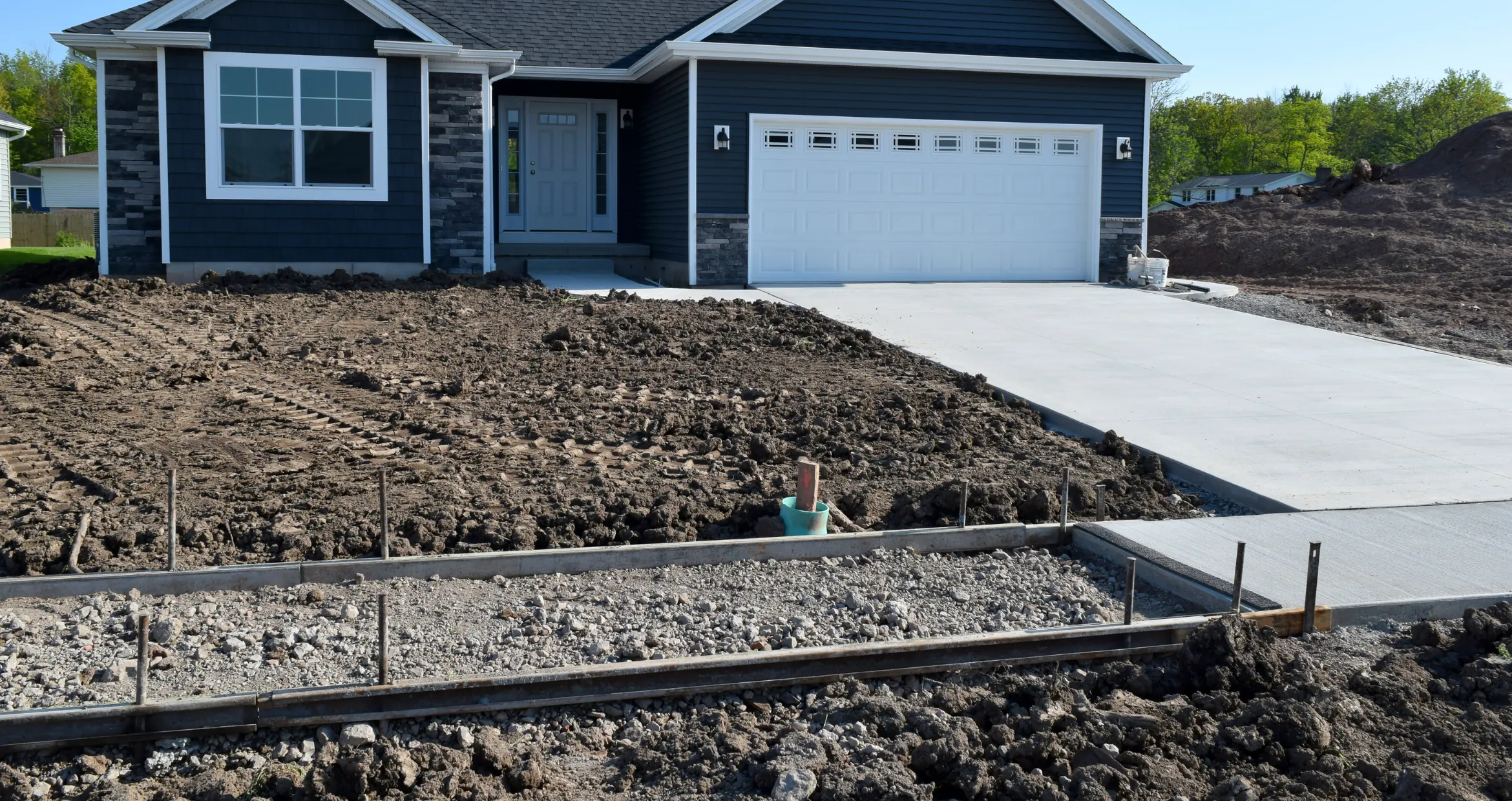 Driveway excavation project in Dallas preparing ground for new concrete installation