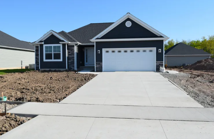 Driveway excavation project in Dallas TX removing soil and preparing base for concrete driveway