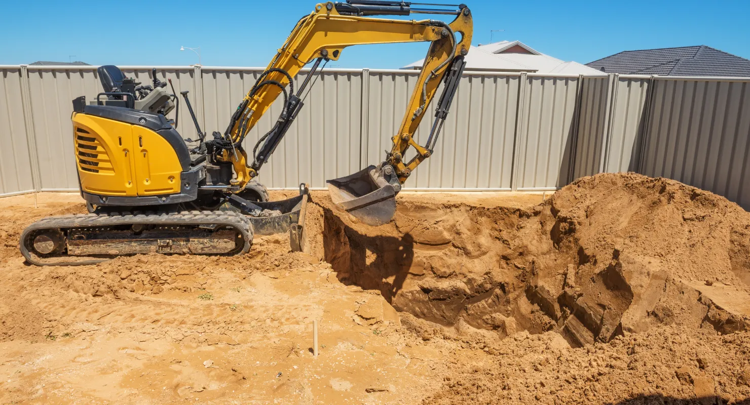 Residential excavation contractor in Dallas handling backyard digging and home addition preparation